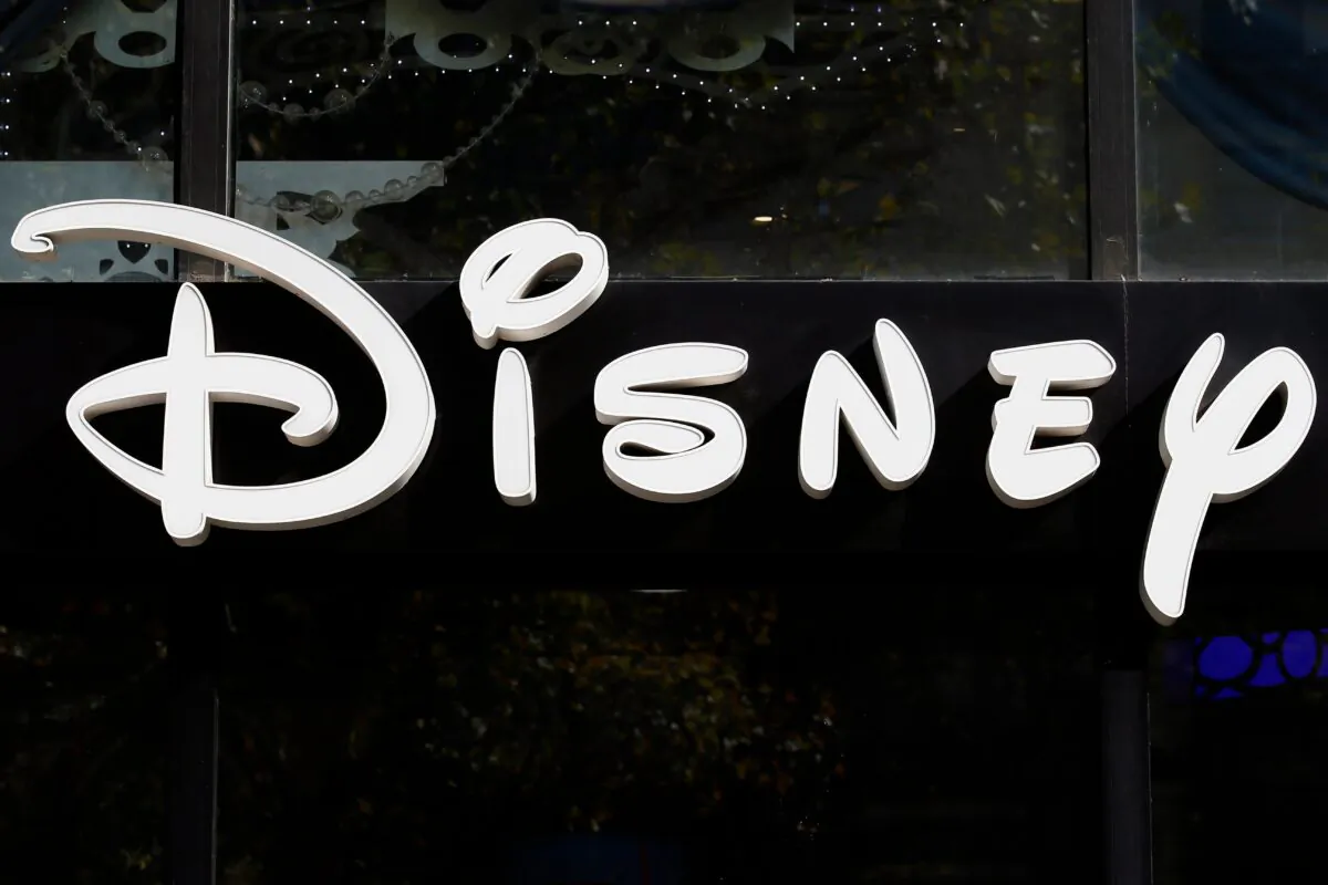 The logo of theme parks "Disney" store is pictured on the Champs Elysees Avenue in Paris, France, on Sept. 20, 2017. (Francois Mori/AP Photo)
