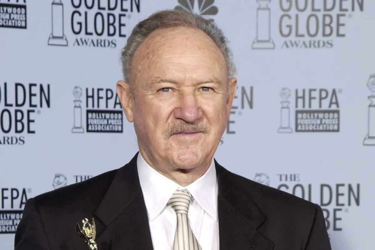 Actor Gene Hackman poses with his Cecil B. Demille Award backstage during the 60th Annual Golden Globe Awards at the Beverly Hilton Hotel in Beverly Hills, Calif., on Jan. 19, 2003. (Robert Mora/Getty Images)