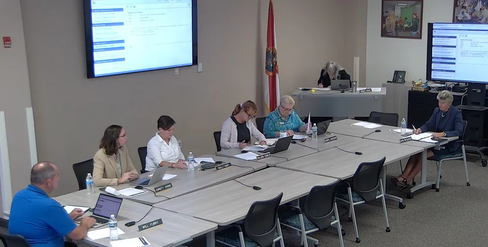 The Flagler County School Board debates the legality of a school bank account for a youth orchestra group at the June 6 workshop meeting. (Screenshot/Flagler County Schools)