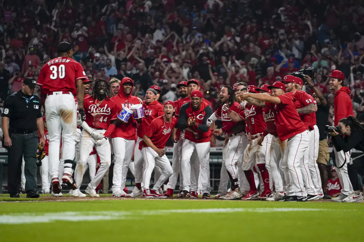 Cincinnati Reds' Will Benson (30) celebrates with teammates after hitting a walk-off, two-run home run against the Los Angeles Dodgers in the ninth inning of a baseball game in Cincinnati on June 7, 2023. (Jeff Dean/AP Photo)