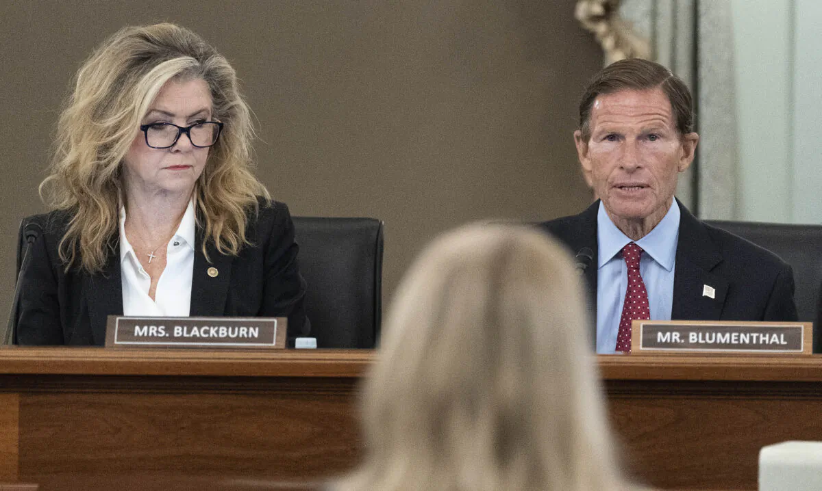Sen. Marsha Blackburn (R-Tenn.) (L) and Sen. Richard Blumenthal (D-Conn.) speak during a hearing in Washington on Oct. 5, 2021. (Alex Brandon/AP Photo)