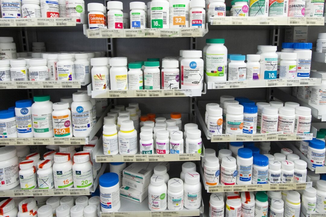 Prescription drugs are seen on shelves at a pharmacy in Montreal, on March 11, 2021. (The Canadian Press/Ryan Remiorz)