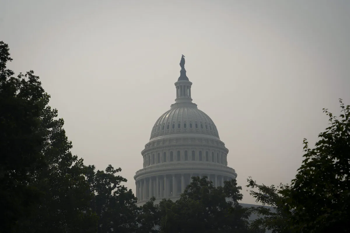 The U.S. Capitol building is under a haze of smoke caused by the ongoing wildfires in Canada in Washington on the morning of June 8, 2023. (Madalina Vasiliu/The Epoch Times)