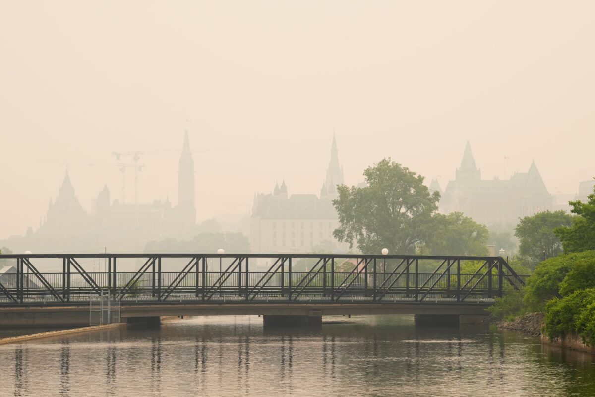 NextImg:Wildfire Smoke Continues to Impact Millions in Canada's Major Cities