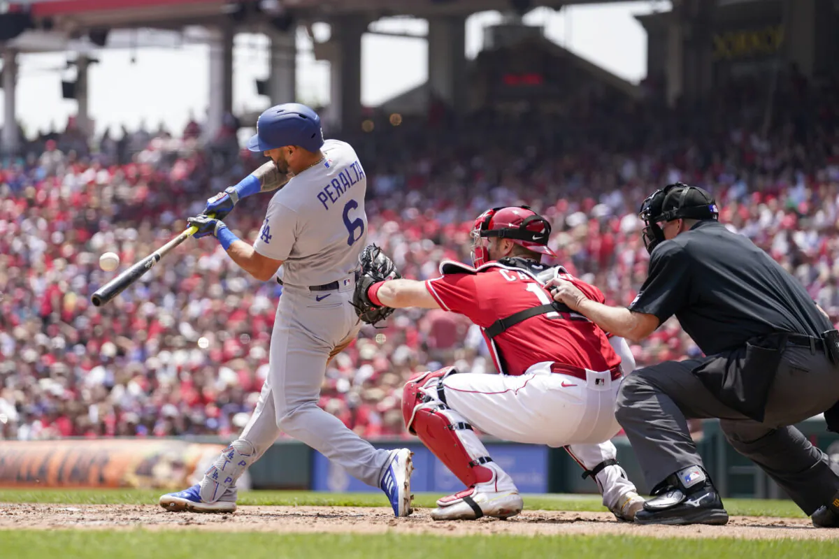 Los Angeles Dodgers' David Peralta (6) hits a two-run single in the third inning of a baseball game against the Cincinnati Reds in Cincinnati on June 8, 2023. (Jeff Dean/AP Photo)