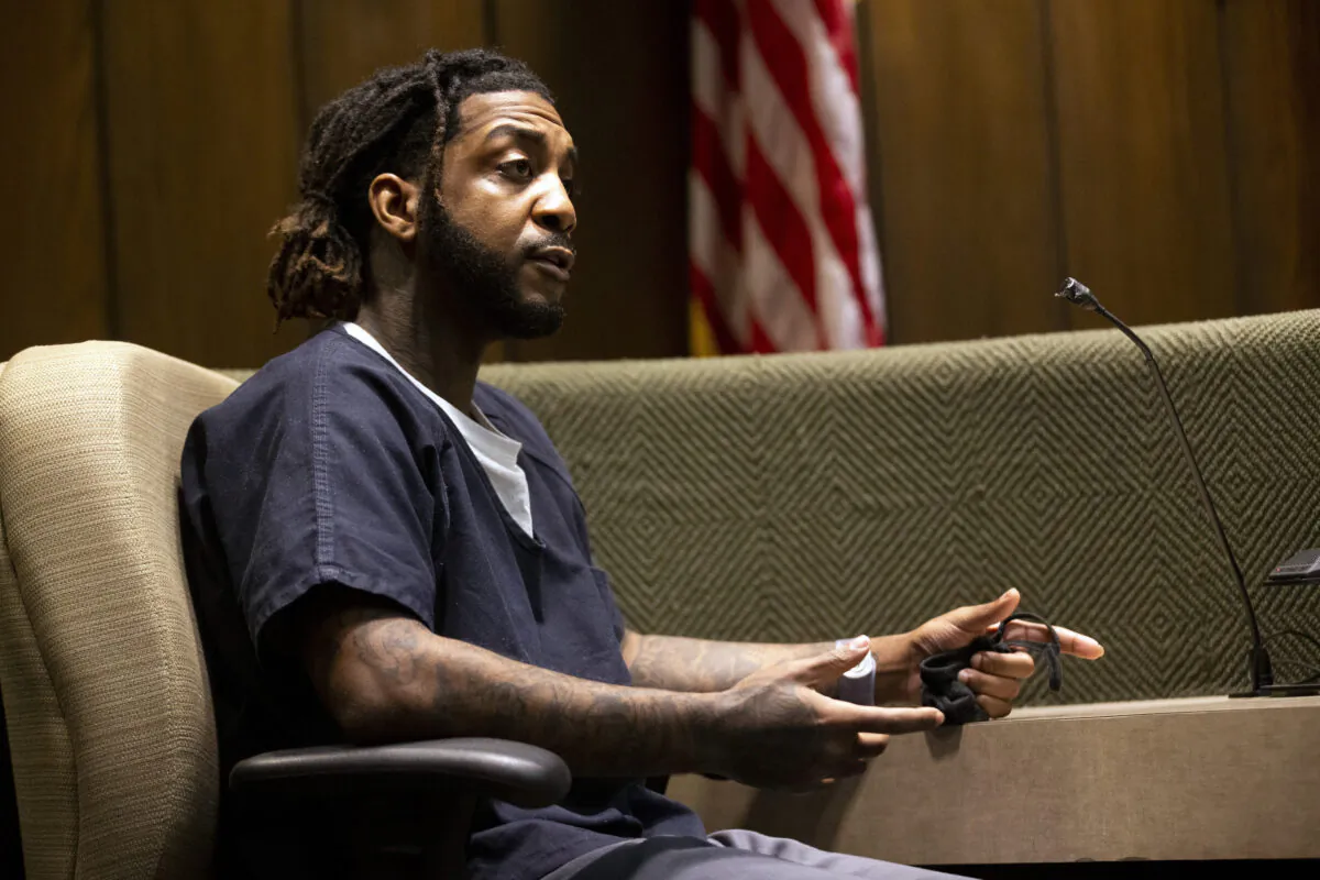 Jermarcus Johnson listens to a question while on the stand at at the Shelby County Criminal Court in Memphis, Tenn., on June 9, 2023. (Chris Day/The Commercial Appeal via AP)
