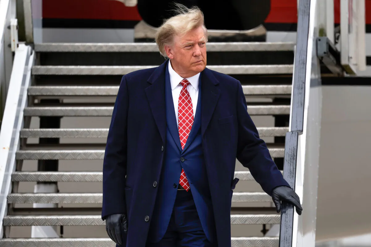 Former President Donald Trump disembarks his plane in Aberdeen, Scotland, on May 1, 2023. (Jeff J Mitchell/Getty Images)