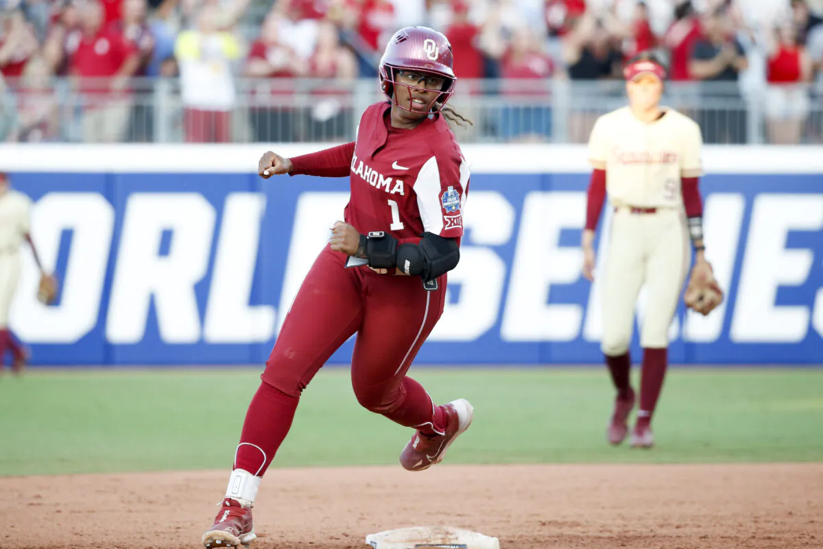 Cydney Sanders of the Oklahoma Sooners rounds second base after hitting a home run during the fifth inning against the Florida State Seminoles in Oklahoma City on June 8, 2023. (Ian Maule/Getty Images)