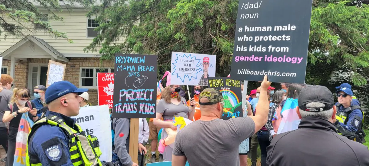Hundreds of protestors and counter-protestors gather in Ottawa's west end to clash over gender ideology being taught in schools. (Matthew Horwood/The Epoch Times)