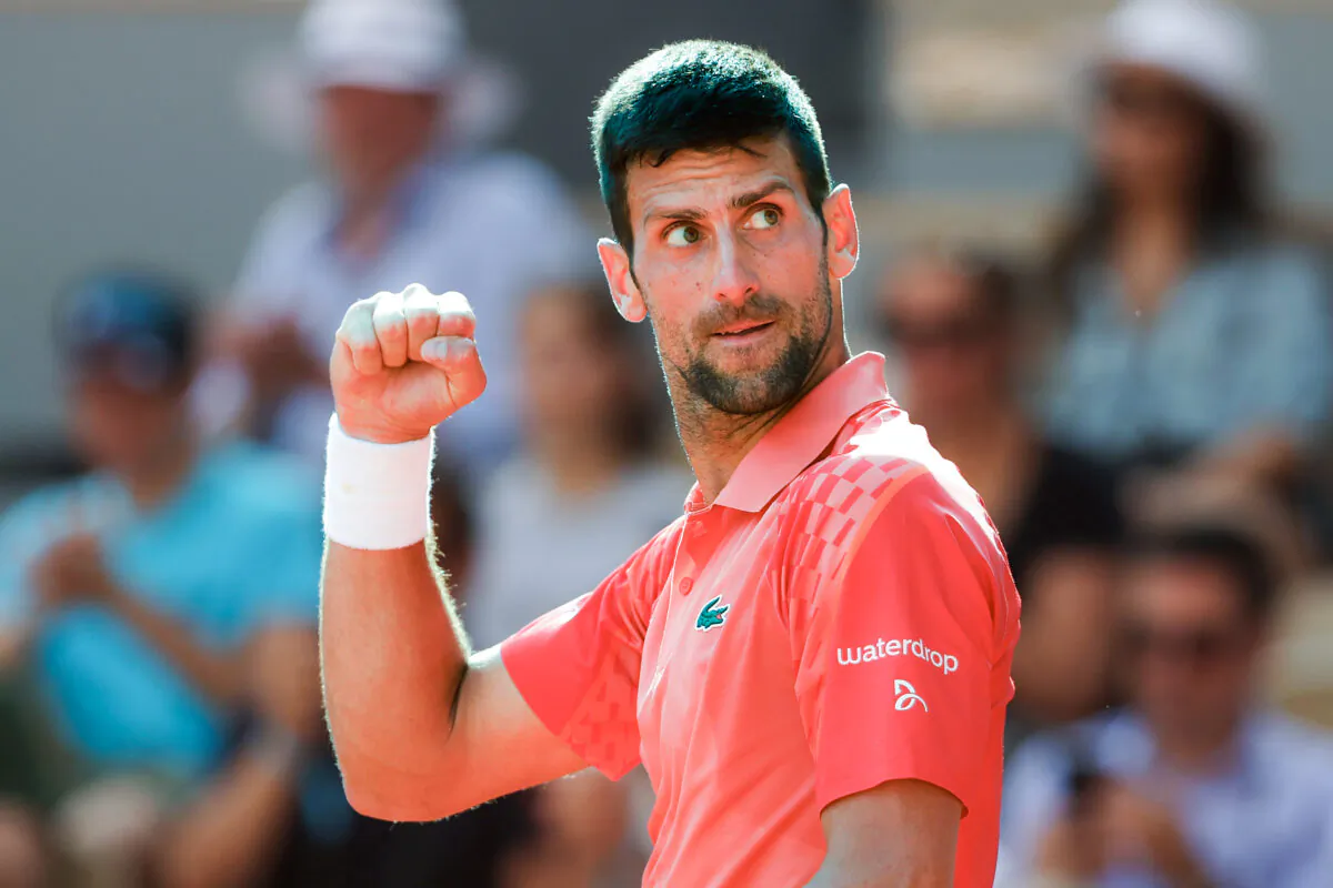 Novak Djokovic of Serbia celebrates winning match point against Carlos Alcaraz of Spain during the Men's Singles Semifinal match on Day Thirteen of the 2023 French Open at Roland Garros in Paris on June 9, 2023. (Julian Finney/Getty Images)
