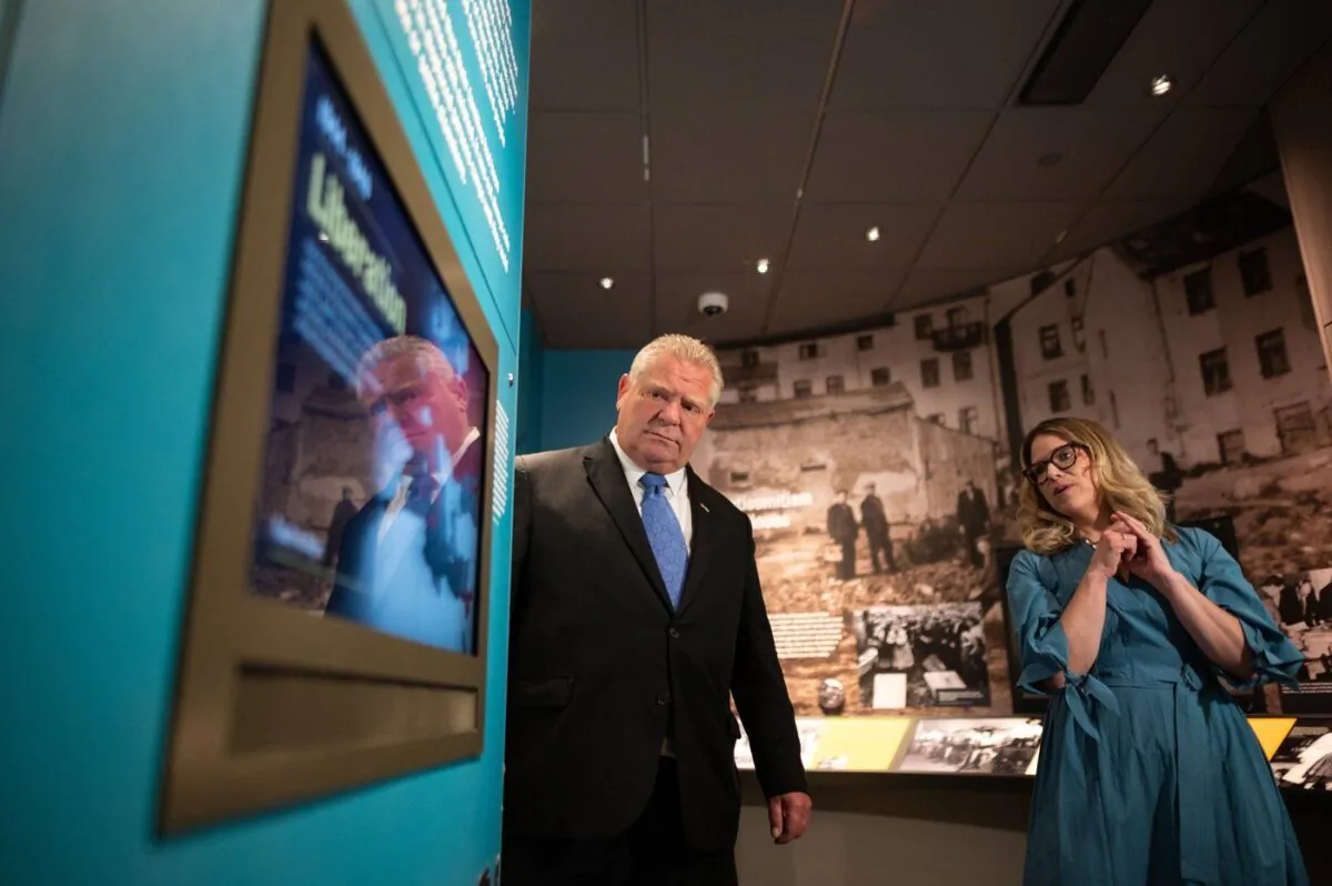 Ontario Premier Doug Ford is guided through a tour at the Toronto Holocaust Museum on June 9, 2023. (The Canadian Press/ Tijana Martin)
