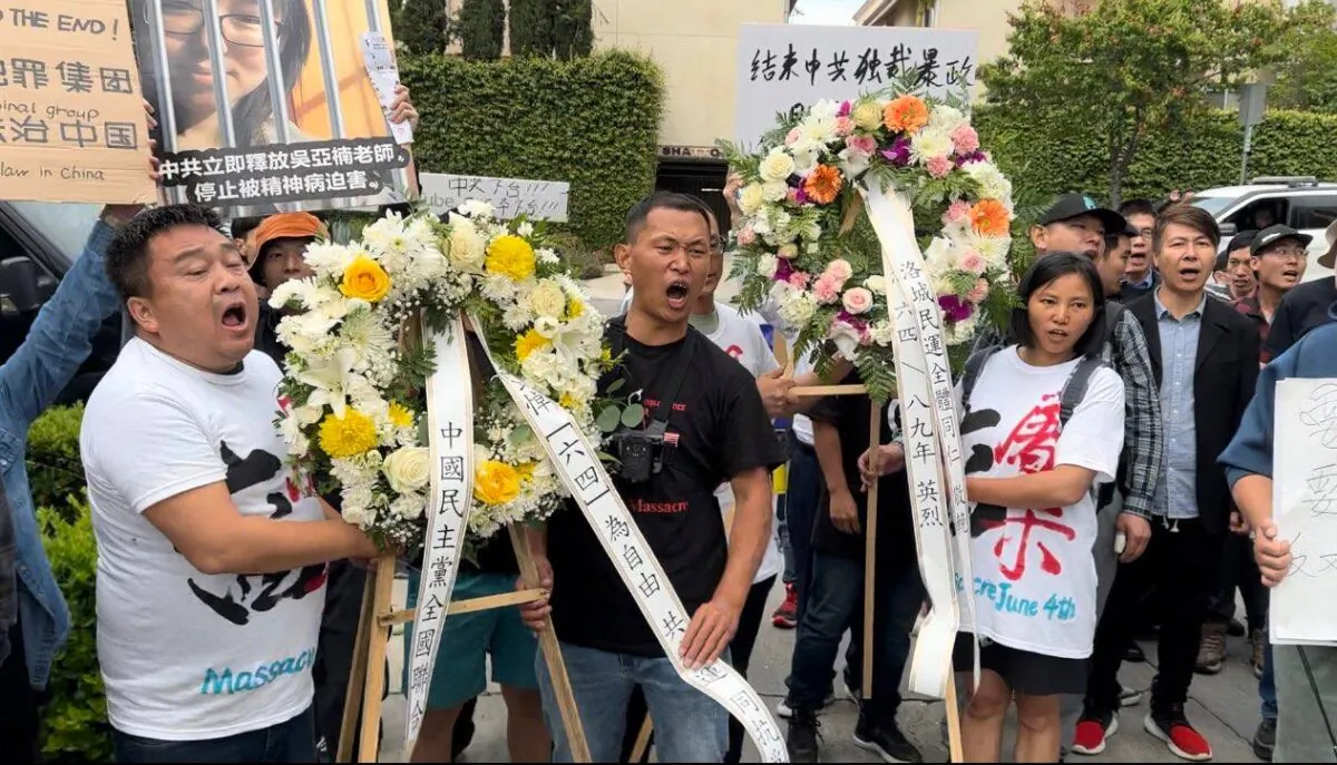 On June 4, 2023 people gather in front of the Chinese consulate in Los Angeles with floral wreaths in memory of those who perished during the Tiananmen Square Massacre in Beijing, June 4, 1989. (Courtesy of Jie Lijian)