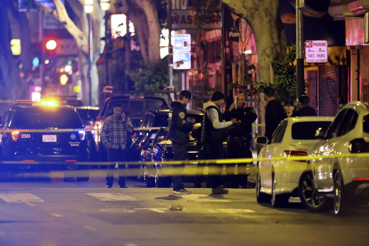 Police secure and investigate the scene of a shooting in San Francisco on June 9, 2023. (Santiago Mejia/San Francisco Chronicle via AP)