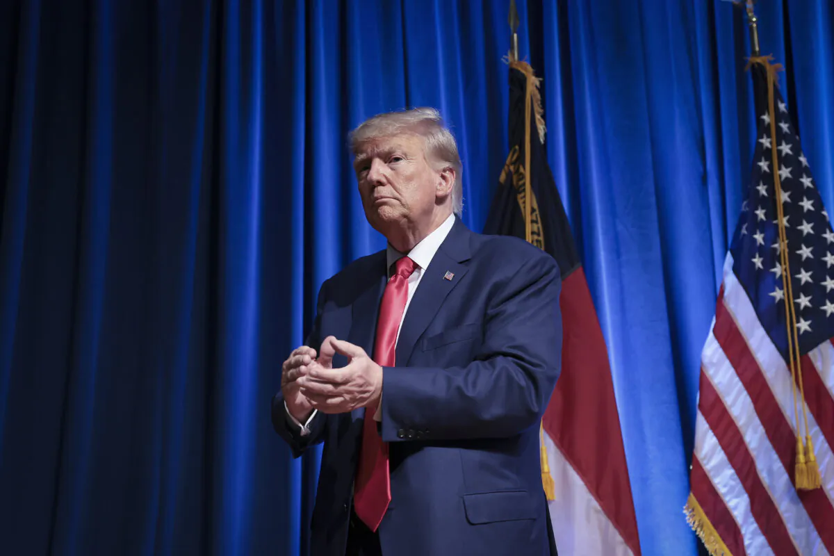 Republican presidential candidate and former President Donald Trump leaves the stage after delivering remarks in Greensboro, N.C., on June 10, 2023. (Win McNamee/Getty Images)