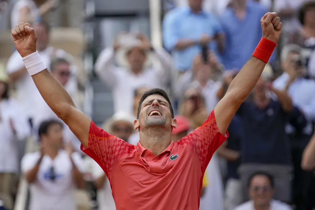 Novak Djokovic celebrates winning the men's singles final match of the French Open tennis tournament in Paris, on June 11, 2023. (Christophe Ena/AP Photo)