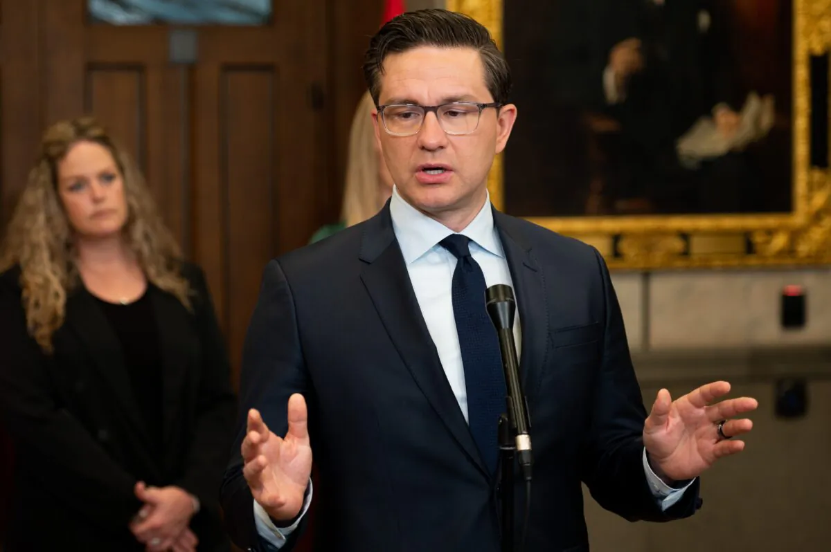 Conservative Party Leader Pierre Poilievre speaks to reporters in the foyer of the House of Commons on Parliament Hill in Ottawa on June 11, 2023. (The Canadian Press/Spencer Colby)