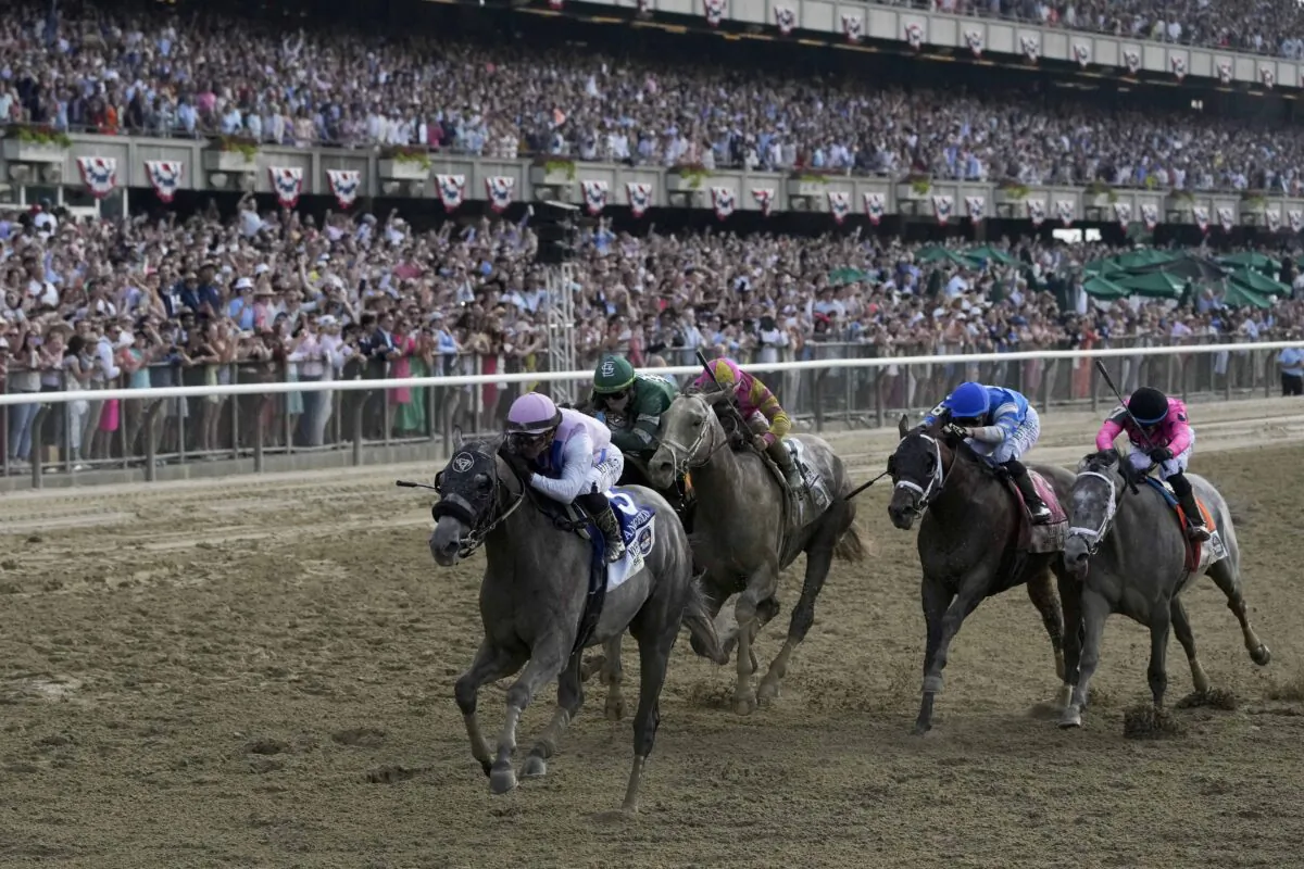 Arcangelo, with jockey Javier Castellano, crosses the finish line to win the 155th running of the Belmont Stakes horse race at Belmont Park in Elmont, N.Y., on June 10, 2023. (Seth Wenig/AP Photo)