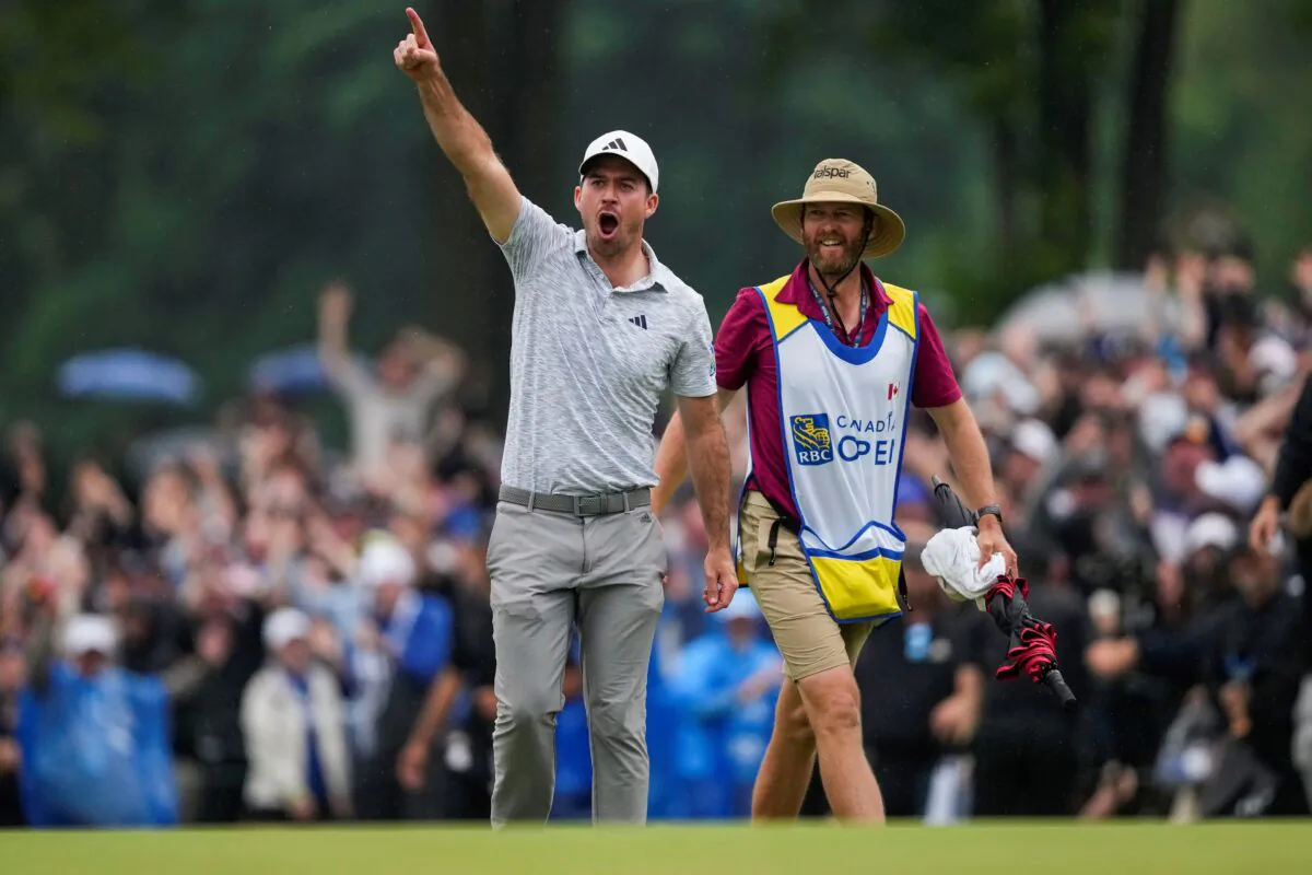 Nick Taylor, of Canada, celebrates after winning the Canadian Open golf tournament in Toronto, on June 11, 2023. (Andrew Lahodynskyj/The Canadian Press via AP)