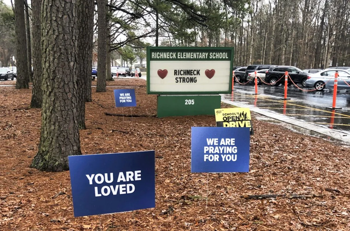 Signs stand outside Richneck Elementary School in Newport News, Va., Jan. 25, 2023. (Denise Lavoie/AP Photo)