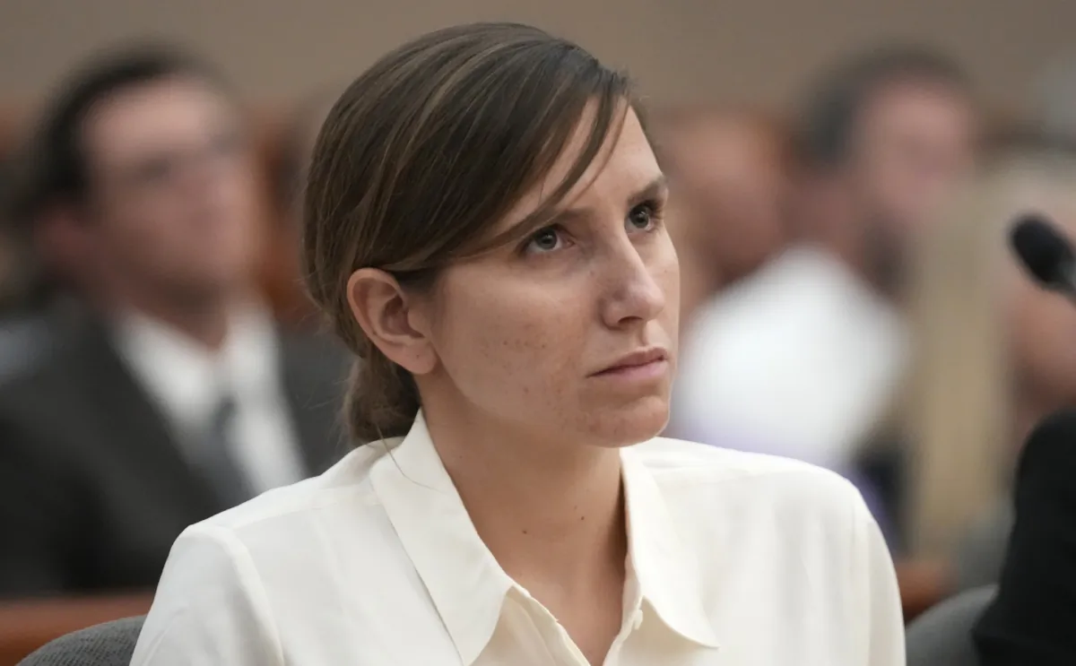 Kouri Richins, a Utah mother of three who authorities say fatally poisoned her husband then wrote a children's book about grieving, looks on during a bail hearing in Park City, Utah, on June 12, 2023. (Rick Bowmer/Pool via AP Photo)