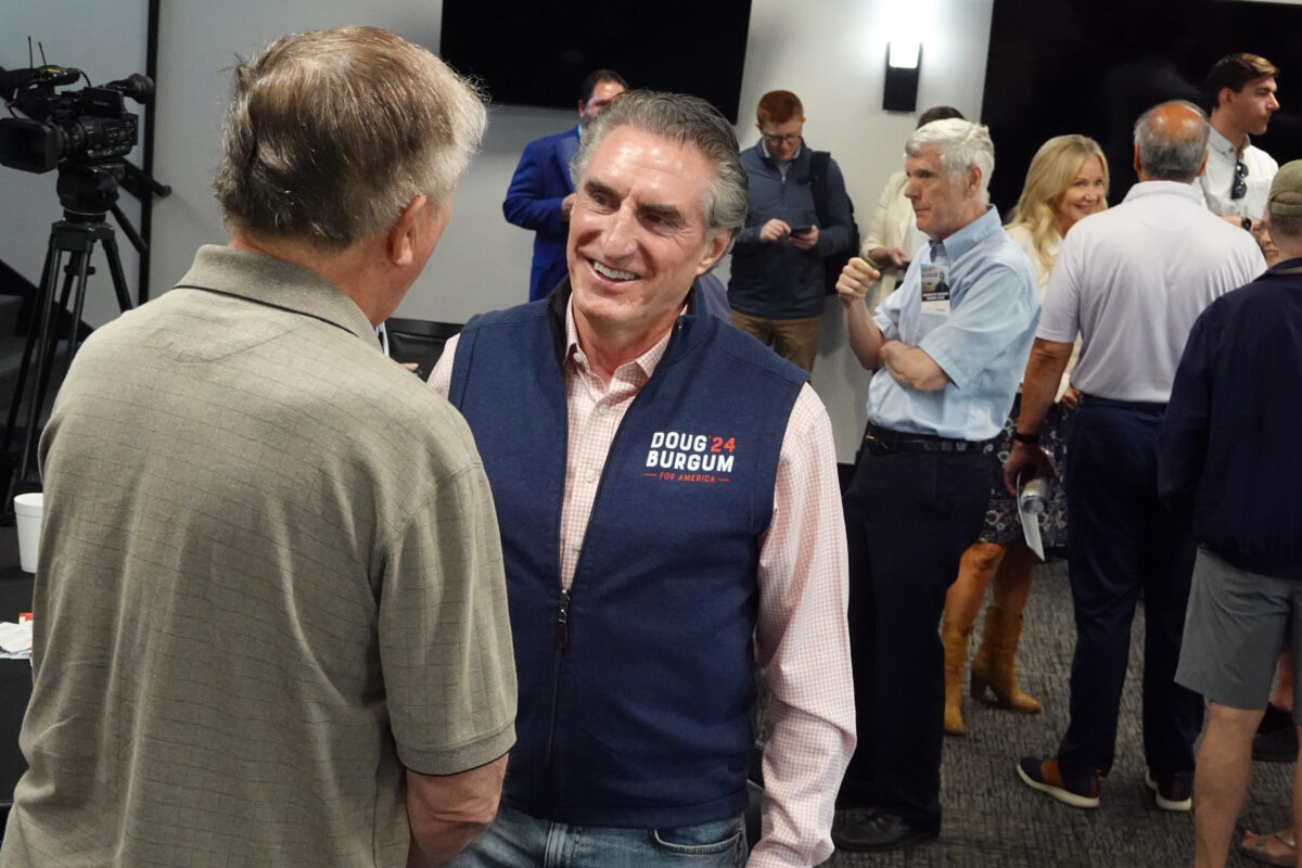 Republican presidential candidate North Dakota Gov. Doug Burgum speaks to guests during a campaign stop at the Westside Conservative Breakfast Club meeting in Ankeny, Iowa, on June 9, 2023. (Scott Olson/Getty Images)