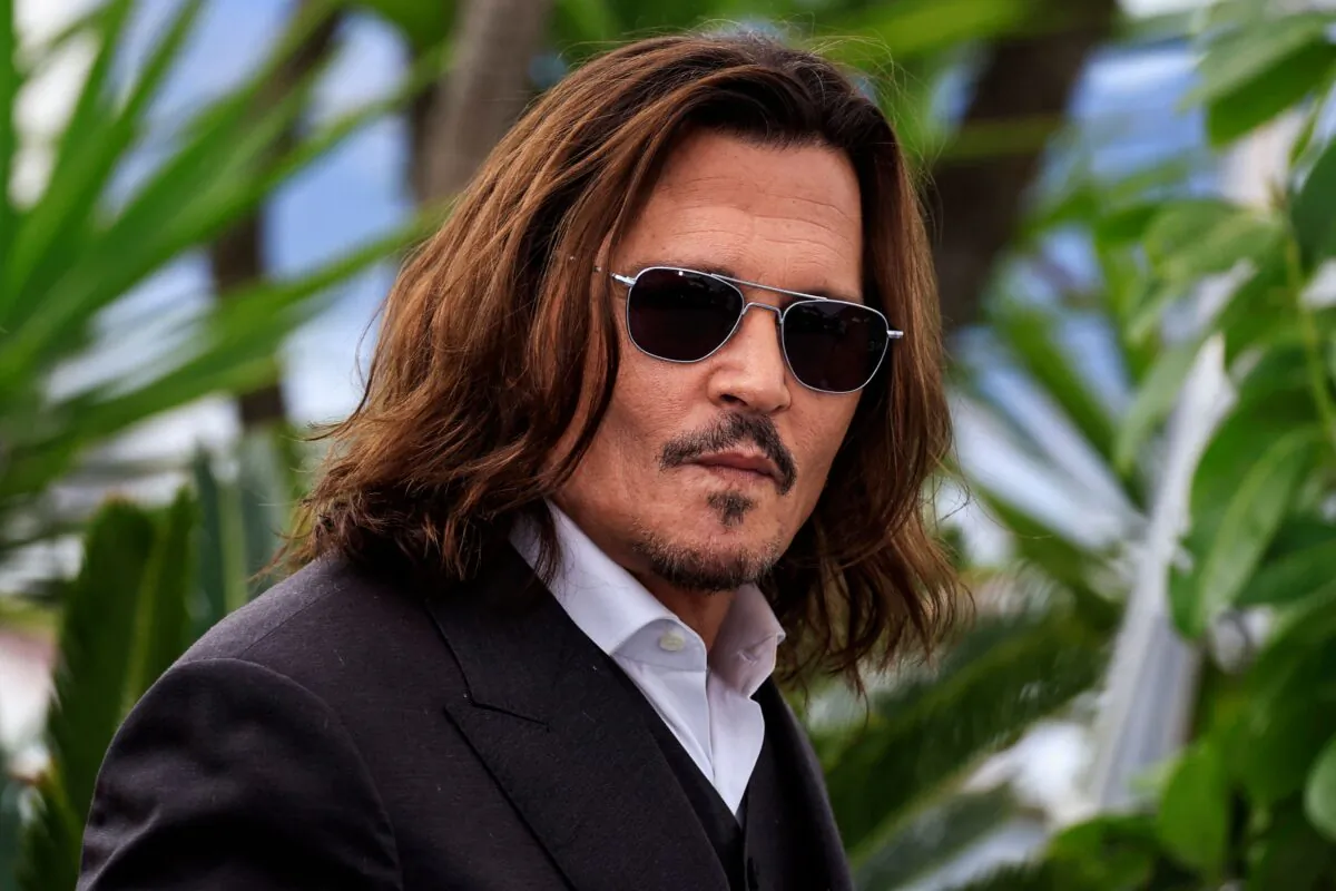 U.S. actor Johnny Depp poses during a photocall for the film "Jeanne Du Barry" during the 76th edition of the Cannes Film Festival in Cannes, southern France, on May 17, 2023. (Valery Hache/AFP via Getty Images)