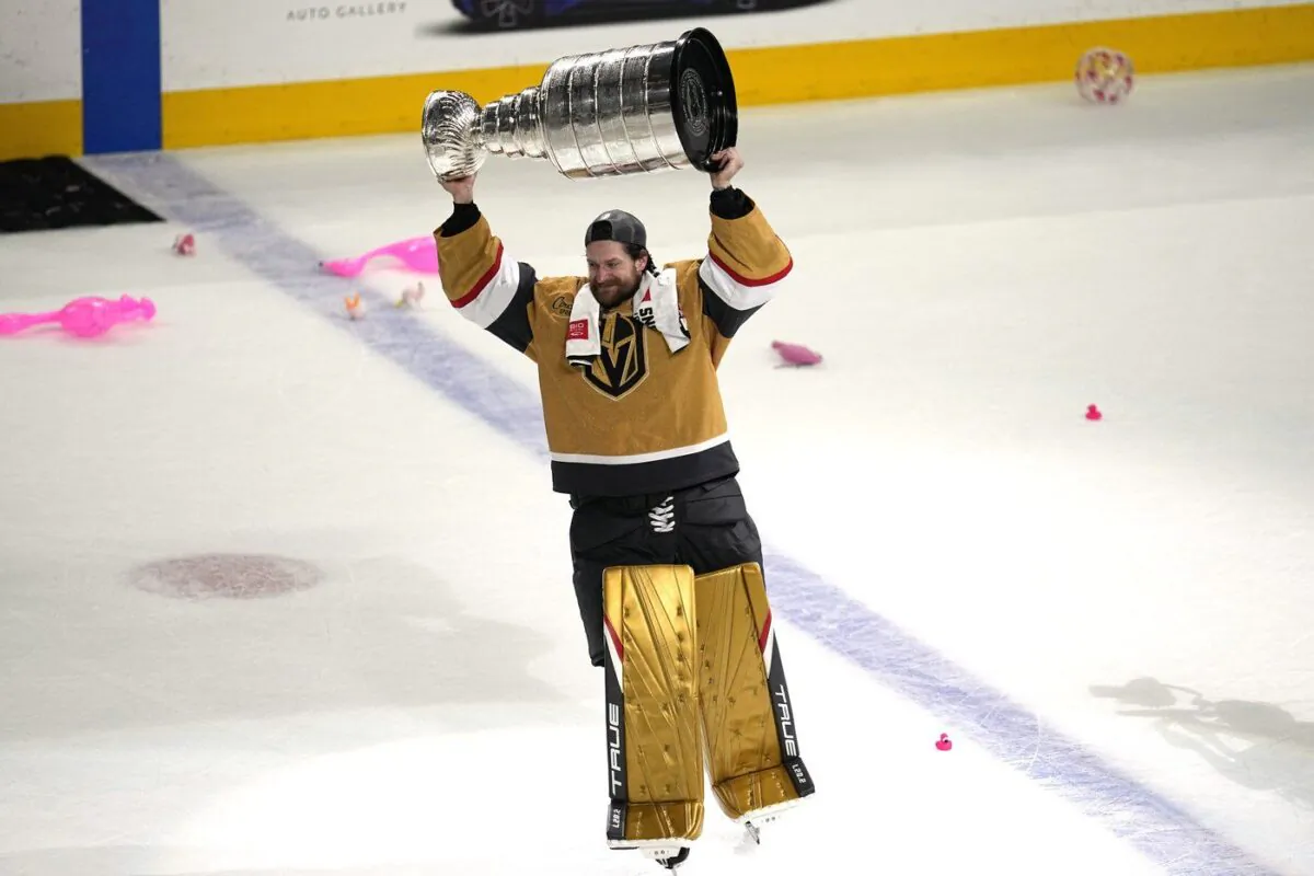 Vegas Golden Knights goaltender Adin Hill skates with the Stanley Cup after the Knights defeated the Florida Panthers 9-3 in Game 5 of the NHL hockey Stanley Cup Finals June 13, 2023, in Las Vegas. (AP Photo/Abbie Parr)
