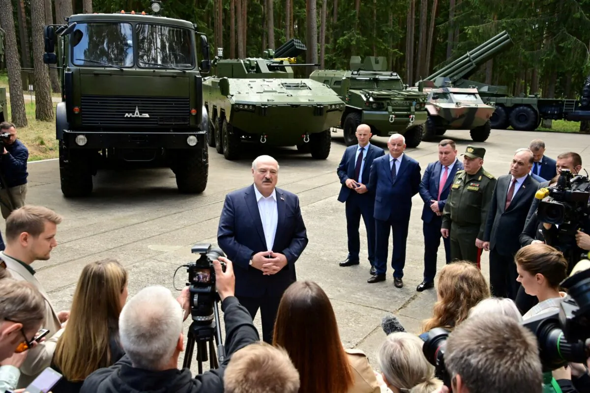 Belarusian President Alexander Lukashenko speaks to journalists during his visit to a military-industrial complex facility in the Minsk Region, Belarus, on June 13, 2023. (Press Service of the President of the Republic of Belarus/Handout via Reuters)