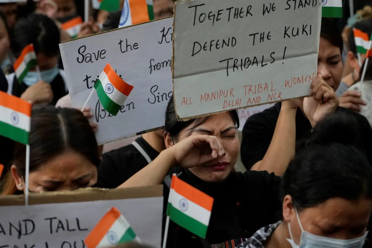 A member of the Kuki tribe cries during a sit in protest against the killing of tribals in their northeastern home state of Manipur, in New Delhi, India, on May 29, 2023. (Manish Swarup/AP Photo)