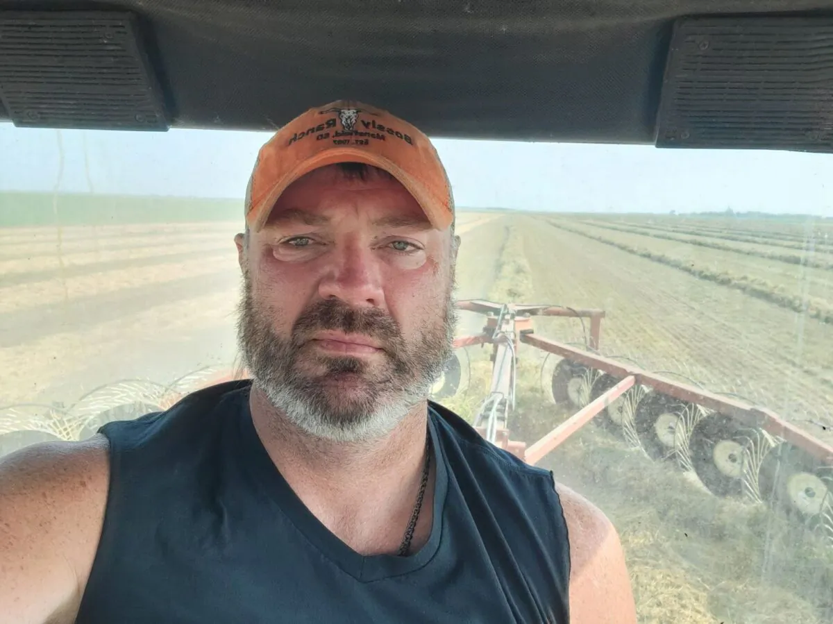South Dakota rancher Jared Bossley cuts hay on his land, June 14, 2023. (Jared Bossley)