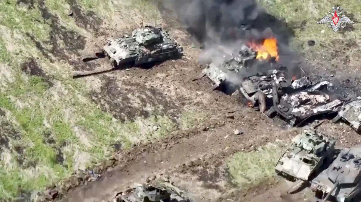 A still image from a video shows what are said to be destroyed armored vehicles of the Ukrainian armed forces, in the course of the Russia–Ukraine conflict in an unidentified location in the southern Donetsk region in Ukraine, in this image taken from a handout footage released on June 10, 2023. (Russian Defense Ministry via Reuters)