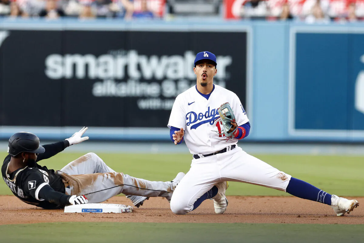 Luis Robert Jr. (88) of the Chicago White Sox steals second base against Miguel Vargas #17 of the Los Angeles Dodgers in the first inning at Dodger Stadium in Los Angeles on June 13, 2023. (Ronald Martinez/Getty Images)