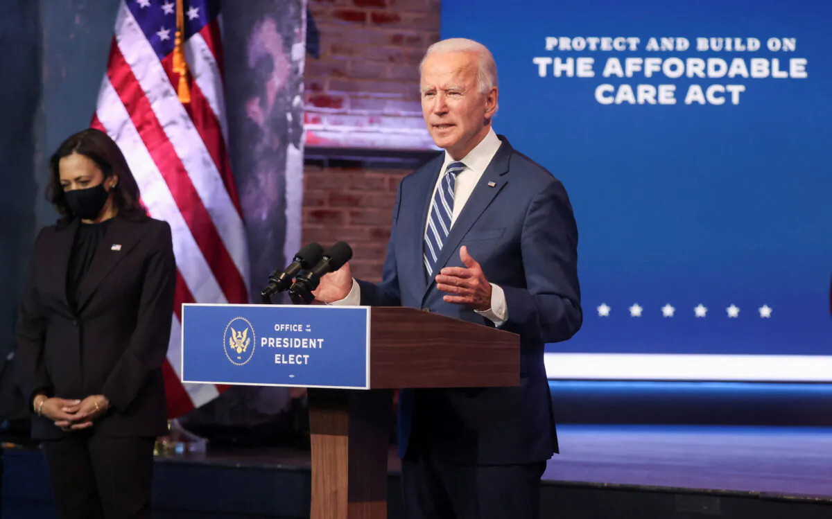 U.S. President Joe Biden talks about protecting the Affordable Care Act (ACA) as he speaks to reporters with Vice President Kamala Harris at this side about their "plan to expand affordable health care" during an appearance in Wilmington, Delaware, November 10, 2020. (Jonathan Ernst/Reuters/File Photo)
