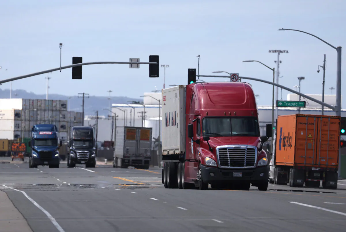 Trucks drive through the Port of Oakland, in Oakland, Calif., on March 31, 2023. (Justin Sullivan/Getty Images)