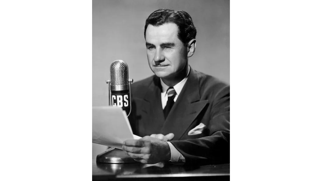American radio broadcaster Lowell Thomas sitting in front of a CBS microphone, circa 1940. (Archive Photos/Getty Images)