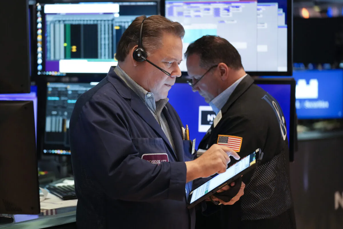 Traders work on the floor at the New York Stock Exchange in New York on June 14, 2023. (Seth Wenig/AP Photo)