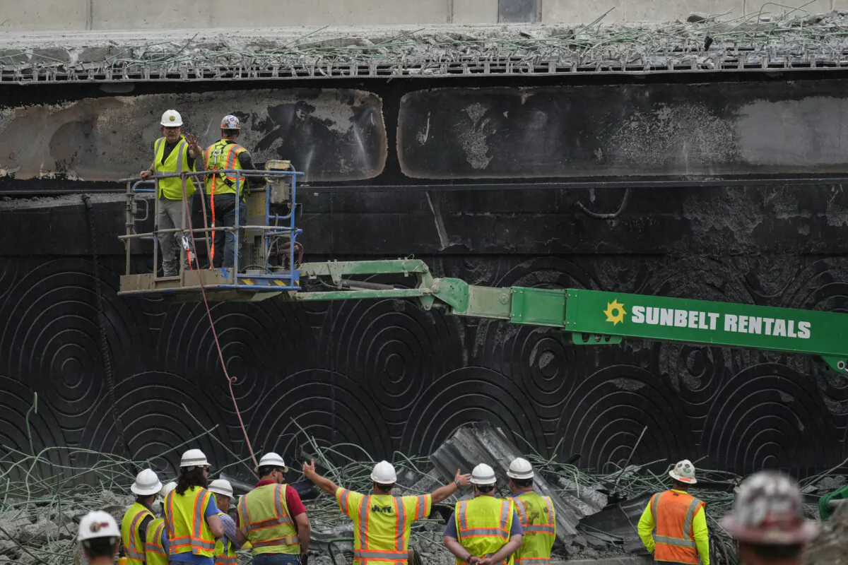 Crews work the scene of a collapsed elevated section of Interstate 95, in Philadelphia on June 14, 2023. (Matt Rourke/AP Photo)