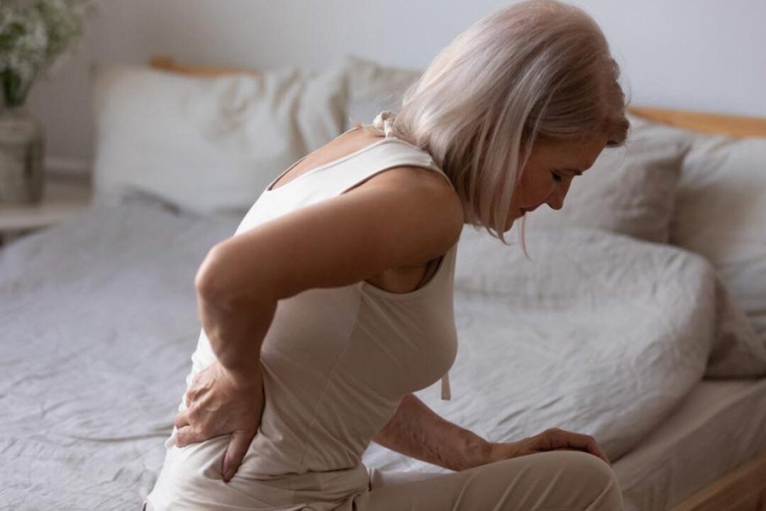 Poor-quality sleep may be due to a spinal issue. (fizkes/Shutterstock)