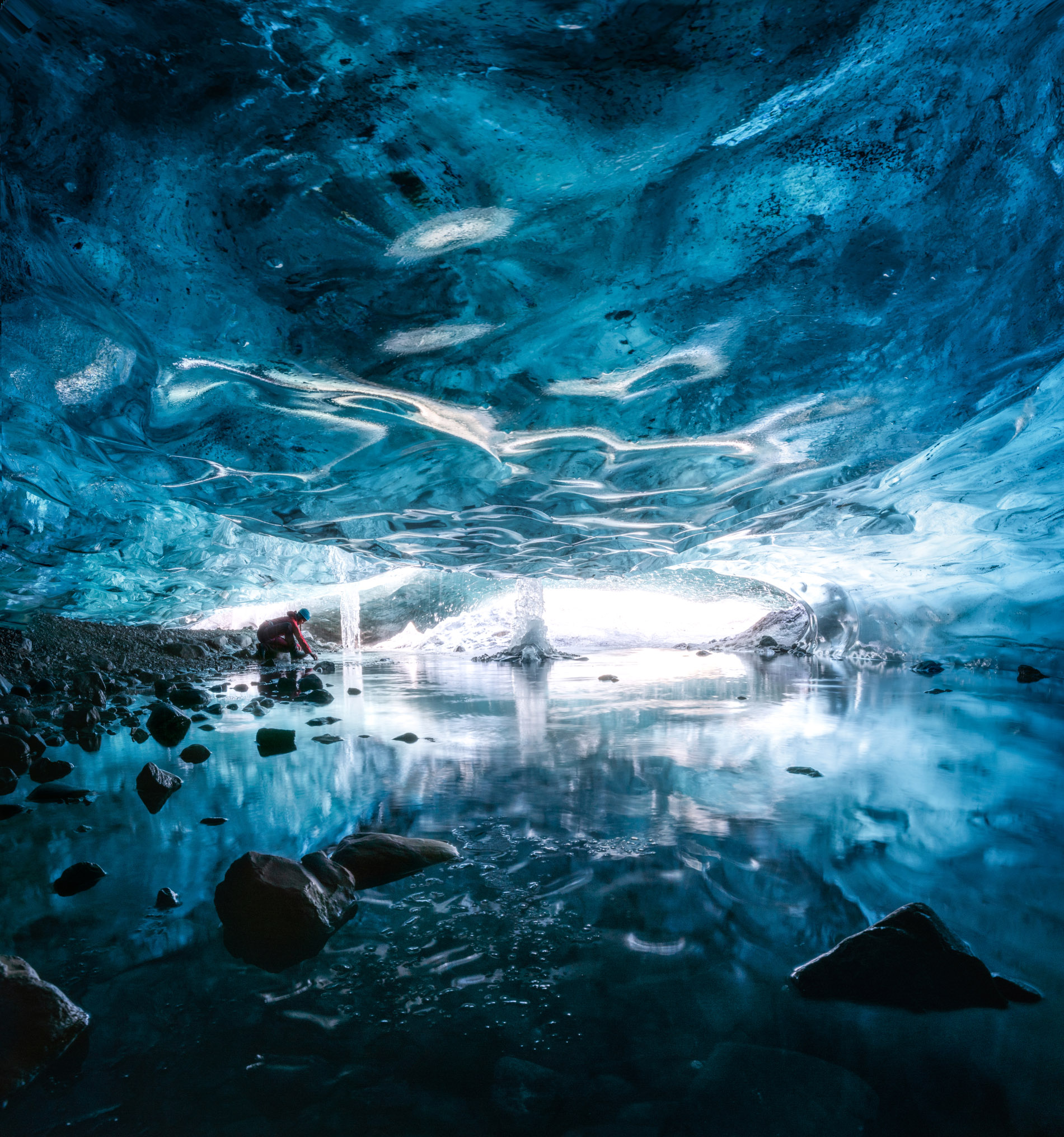 Photographer's Otherworldly Shots of Glacial Caves in Iceland Will