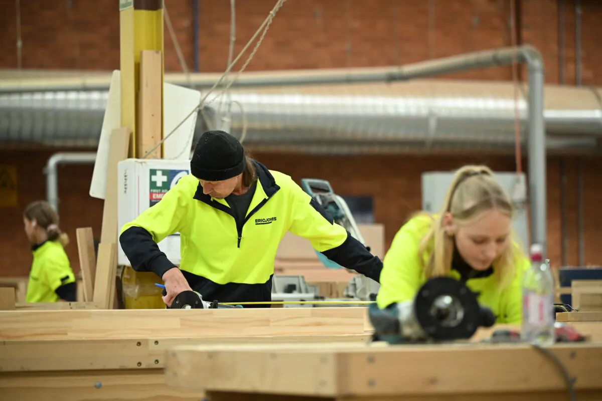 Employees are seen at work during a workshop tour, in Melbourne, Australia, on April 20, 2023. (AAP Image/James Ross)