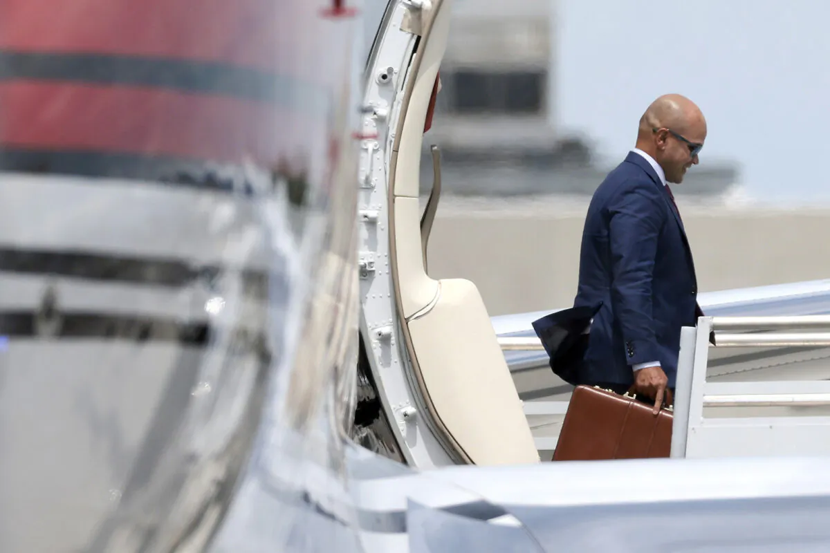 Walt Nauta, valet to former President Donald Trump and a co-defendant in federal charges filed against Trump, arrives at the Miami International Airport, in Miami, Fla., on June 12, 2023. (Win McNamee/Getty Images)