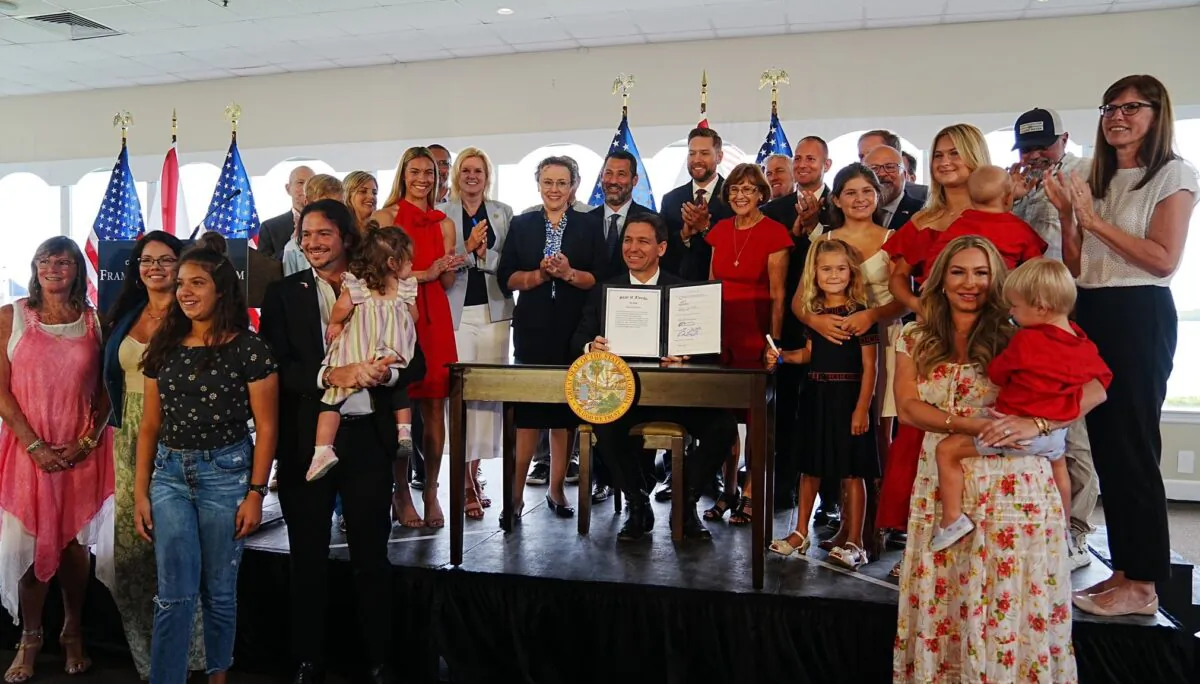 Florida Gov. Ron DeSantis signed the state's record $116.5 billion budget for fiscal year 2023-24 in a ceremony at the Pelican Yacht Club in Fort Pierce on June 15, 2023. (Courtesy of the Florida governor's office)