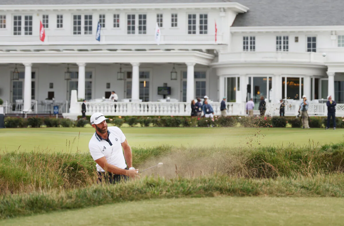 Dustin Johnson of the United States plays a shot from a bunker on the 18th hole during the first round of the 123rd U.S. Open Championship at The Los Angeles Country Club in Los Angeles on June 15, 2023. (Harry How/Getty Images)