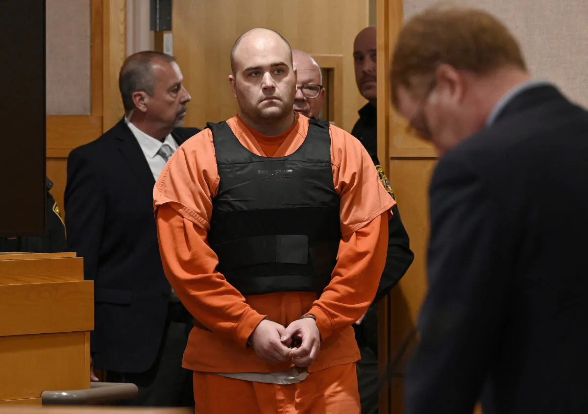 Joseph Eaton enters the court for his arraignment in West Bath, Maine, on April 20, 2023. (Shawn Patrick Ouellette/Portland Press Herald via AP)