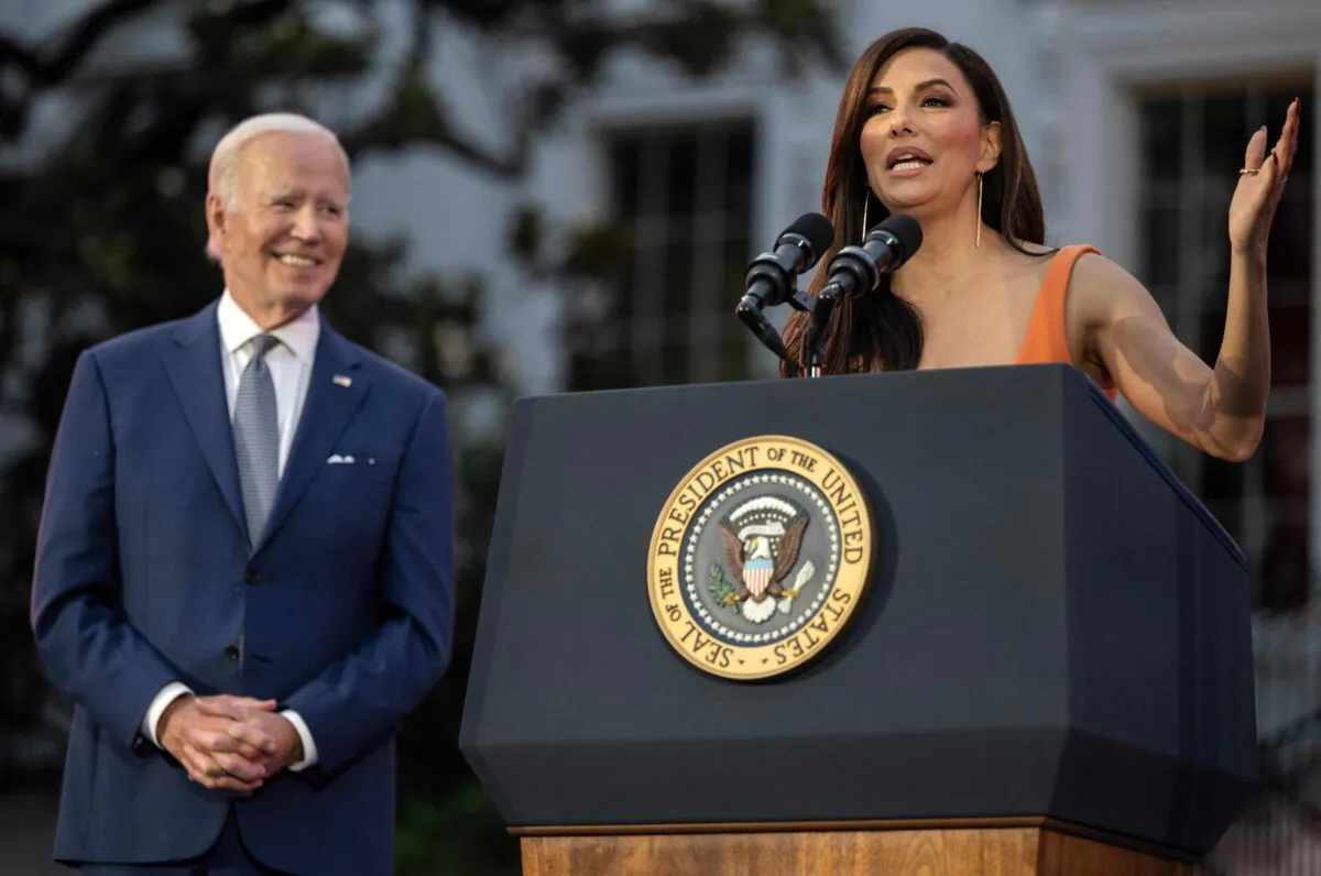 U.S. actress and director Eva Longoria (R) speaks flanked by President Joe Biden during a screening of the film "Flamin' Hot" at the White House in Washington, D.C. on June 15, 2023. (Andrew Caballero-Reynolds/AFP via Getty Images)