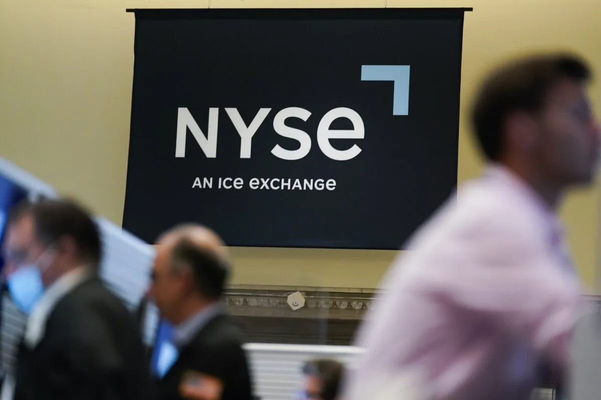 An NYSE sign on the floor at the New York Stock Exchange in New York on June 15, 2022. (Seth Wenig/AP Photo)