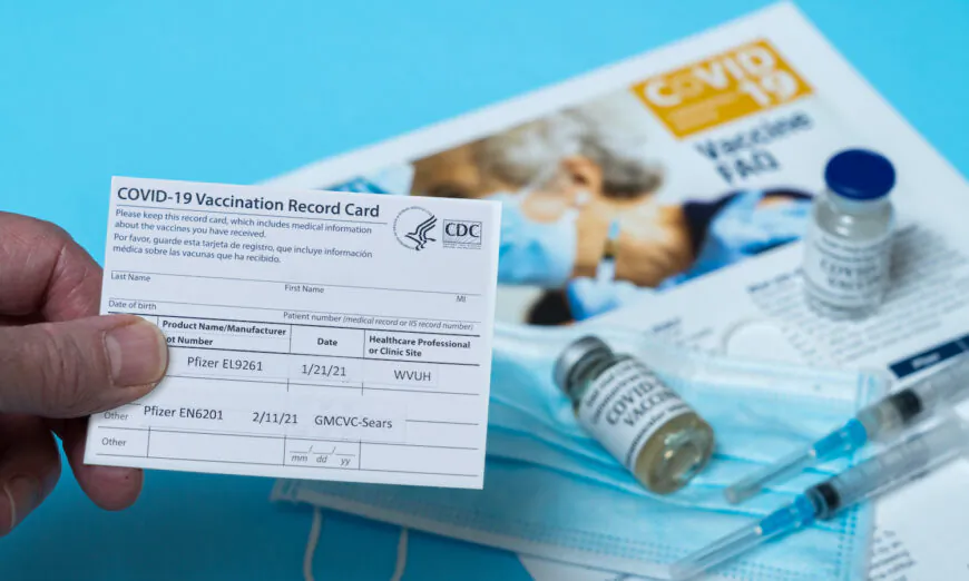 Morgantown, WV - 22 February 2021: Covid-19 vaccination record card showing first and second doses of Pfizer vaccine in West Virginia (Steve Heap/Shutterstock)