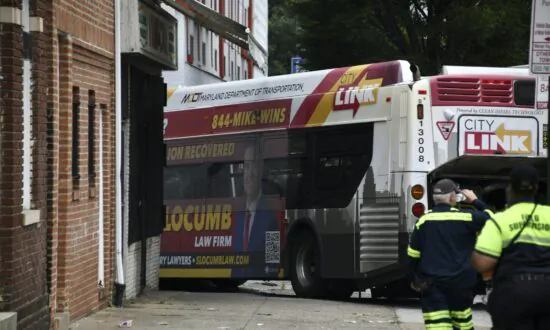 At Least 15 Injured as Baltimore Bus Crashes Into 2 Cars, Building