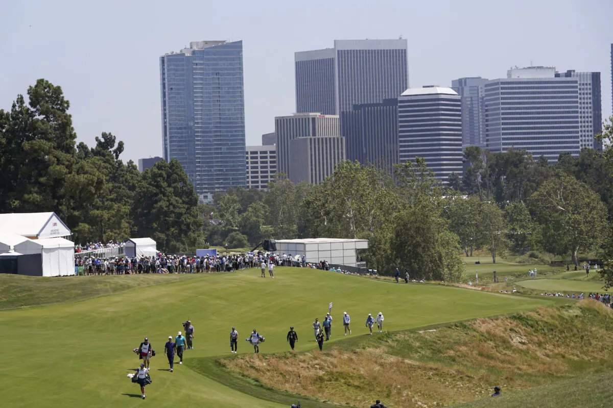 Golfers walk on the third hole during the second round of the U.S. Open golf tournament at Los Angeles Country Club in Los Angeles on June 16, 2023. (Marcio J. Sanchez/AP Photo)