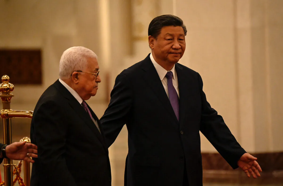 Chinese leader Xi Jinping (R) and Palestinian leader Mahmud Abbas attend a welcoming ceremony in Beijing on June 14, 2023. (Jade Gao/Pool via Getty Images)